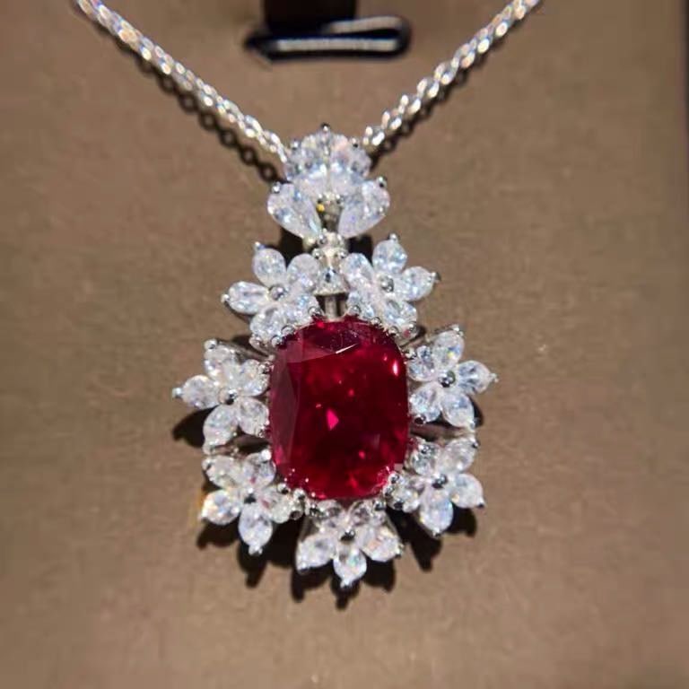 925 Silver 5ct Ruby Pendant: 925 Silver 5ct Ruby Pendant ****** Metal: 925 Silver / Main Stone: Ruby / Color: Red / Carat Weight: 5 / Pendant Size: 25*35mm / Length : 40cm