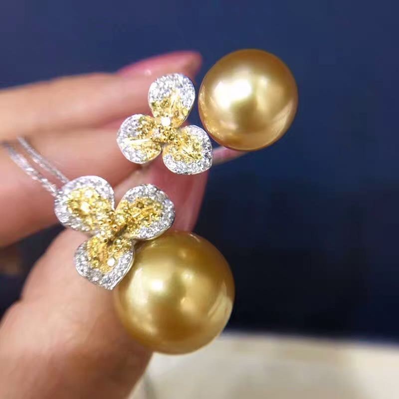 South Sea Golden Pearl 925 Silver Pendant and Ring Two-Piece Set: South Sea Golden Pearl 925 Silver Pendant and Ring Two-Piece Set ****** Metal: South Sea Pearl / Color: Golden / Pendant Pearl Diameter 14mm, Ring Pearl Diameter 12mm
