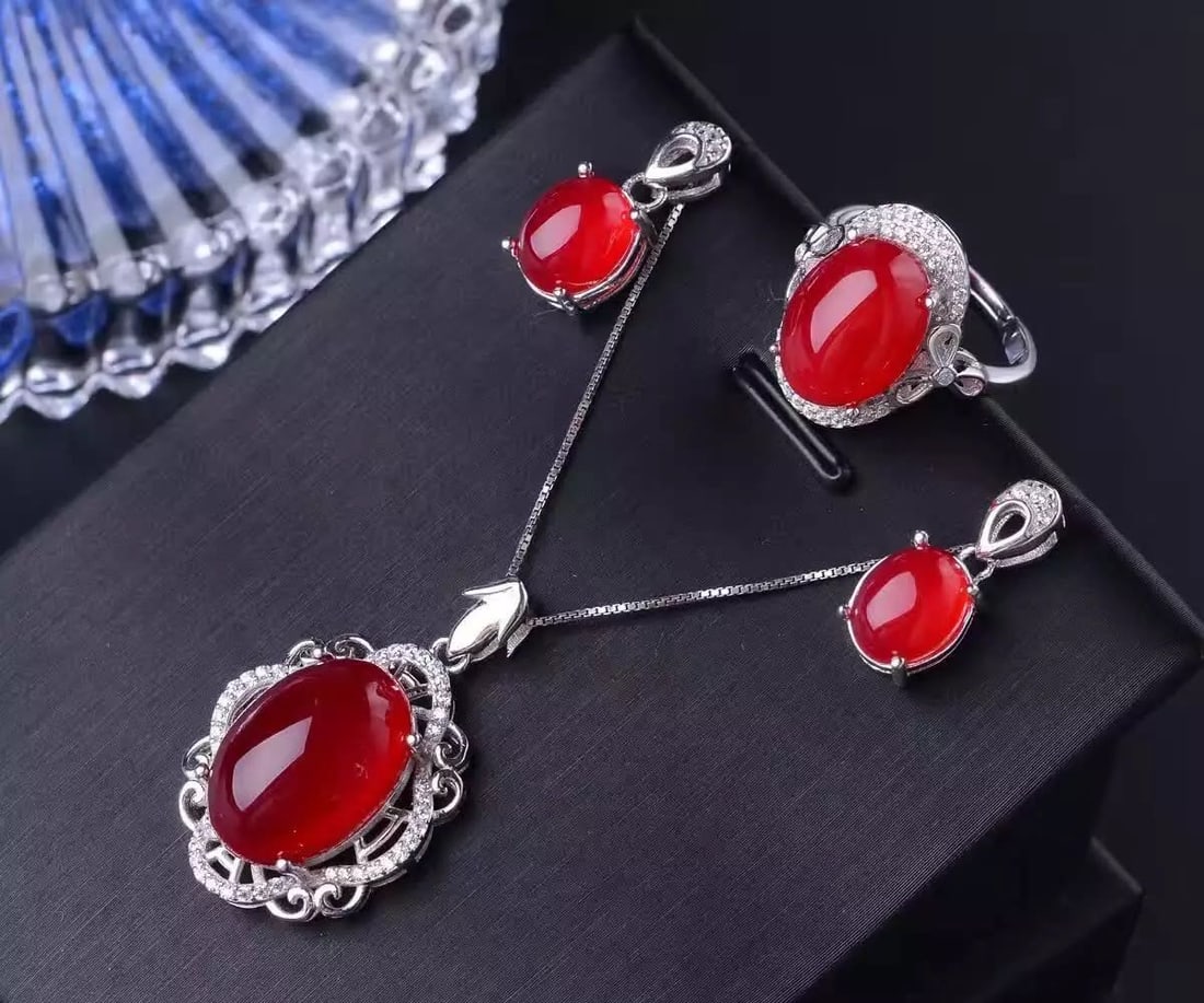 925 Silver Jade Necklace Earrings and Ring Three-Piece Set: 925 Silver Jade Necklace Earrings and Ring Three-Piece Set ****** Metal: 925 Silver / Main Stone: Jade / Color: Red / Pendant Main Stone Size: 13*18mm / Ring Main Stone Size: 10*14mm / Earrings Main S
