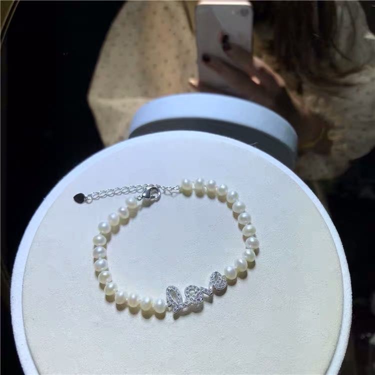 Natural Pearl 925 Silver Love Bracelet: Natural Pearl 925 Silver Love Bracelet ****** Metal: Natural Pearl / Color: White / Pearl Diameter 7mm, Bracelet Length 18mm