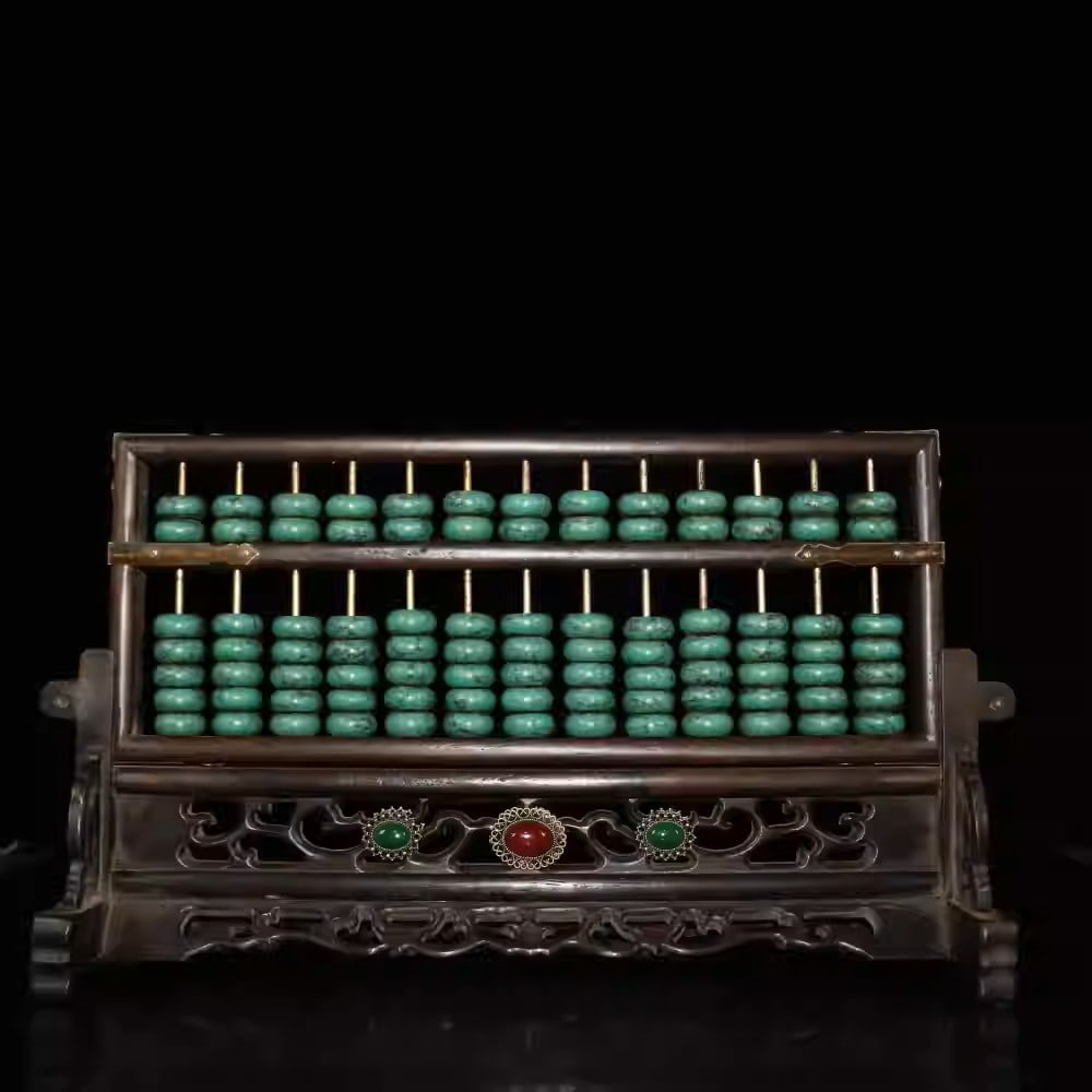Rosewood abacus inlaid with gemstones: Length 35 cm, width 9 cm, height 21 cm, weight 1390 grams.