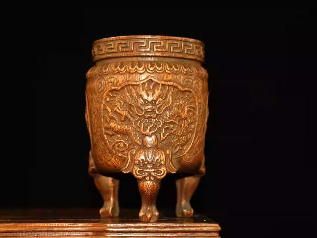 Rosewood pen holder carved with auspicious mythical beast and dragon motifs: Height 14.5 cm, diameter 9.5 cm, weight 400 grams.