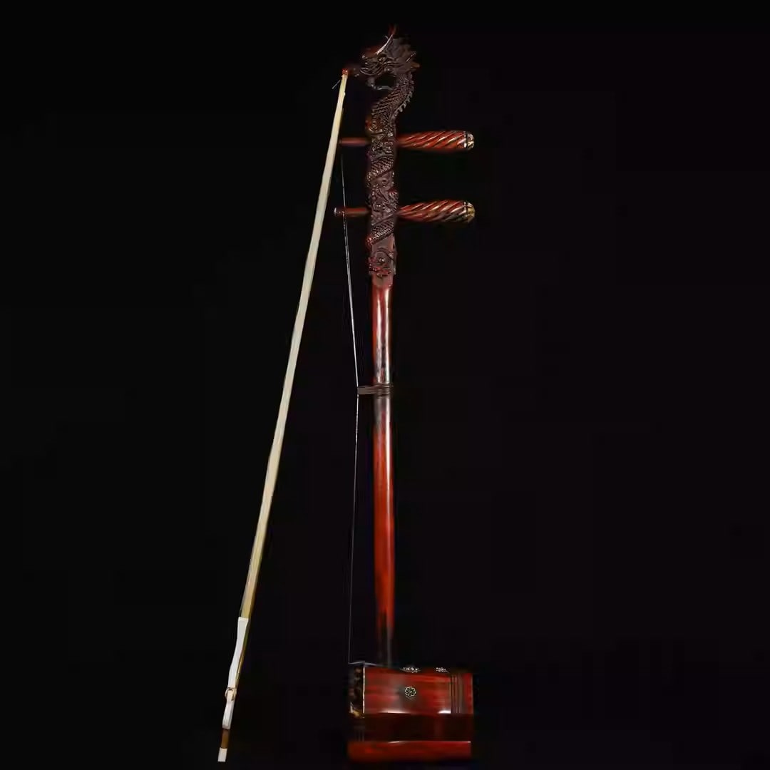 A rosewood carved dragon-head erhu: Length: 83 cm, Width: 15.5 cm
