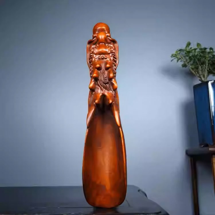 Boxwood finely carved tea scoop depicting a dragon playing with a pearl: Length: 15cm, Width: 3cm, Height: 2cmWeight: 47g