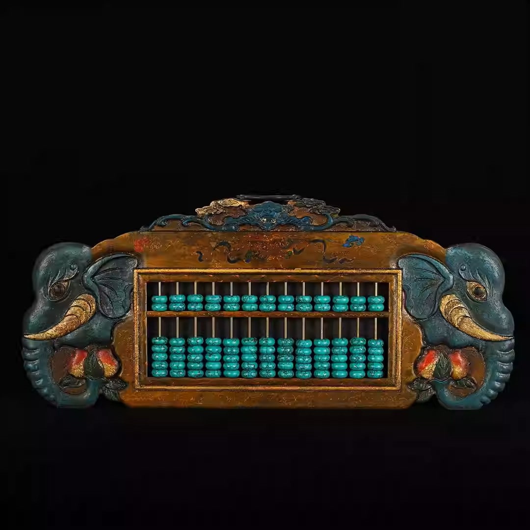 Wooden lacquerware abacus with peach and elephant motifs: Length 60 cm, width 31.5 cm, thickness 2.8 cm.