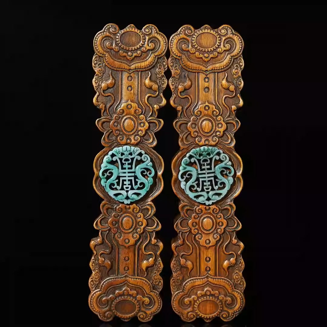 A pair of rosewood rulers, carved with auspicious patterns: Each piece Length 26cm, width 6.5cm, thickness 2.6cm, total weight 540g