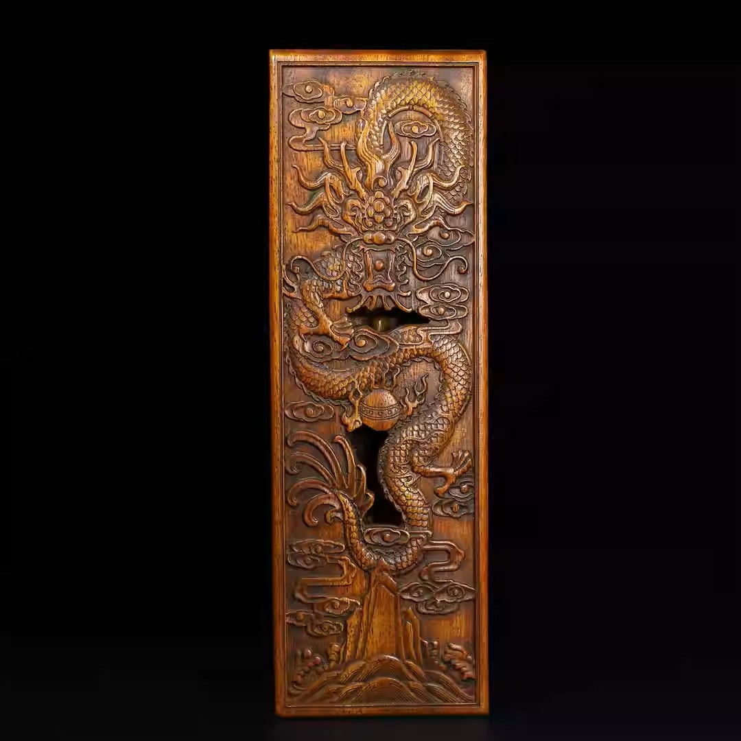 Rosewood pen box intricately carved with a dragon playing with a pearl: Dimensions: Length 30cm, Width 10cm, Thickness 4.5cm Weight: 891g