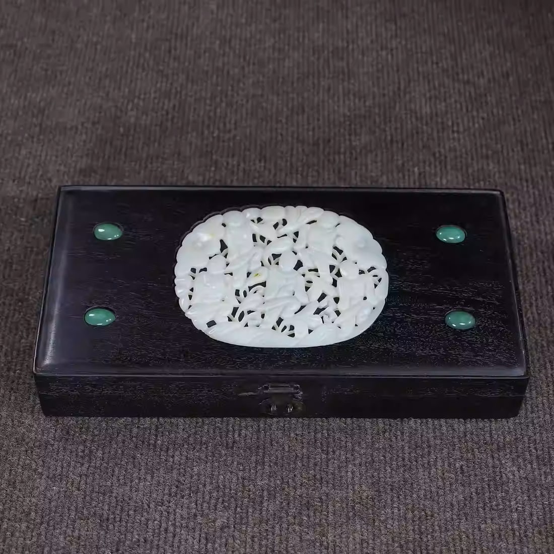 An ebony wood box inlaid with jade, containing a jade abacus.: Dimensions: Length 28.5cm, Width 14.5cm, Thickness 4.6cm