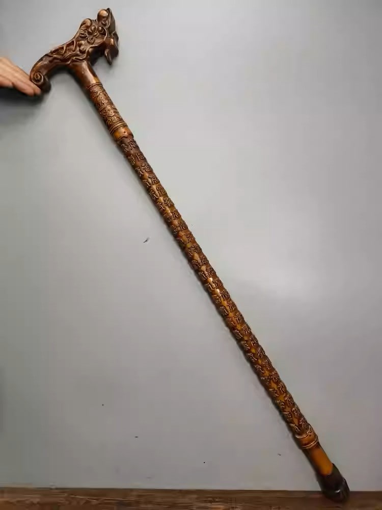 Peach wood carved walking stick with a dragon head and the character for longevity (1 of 5)