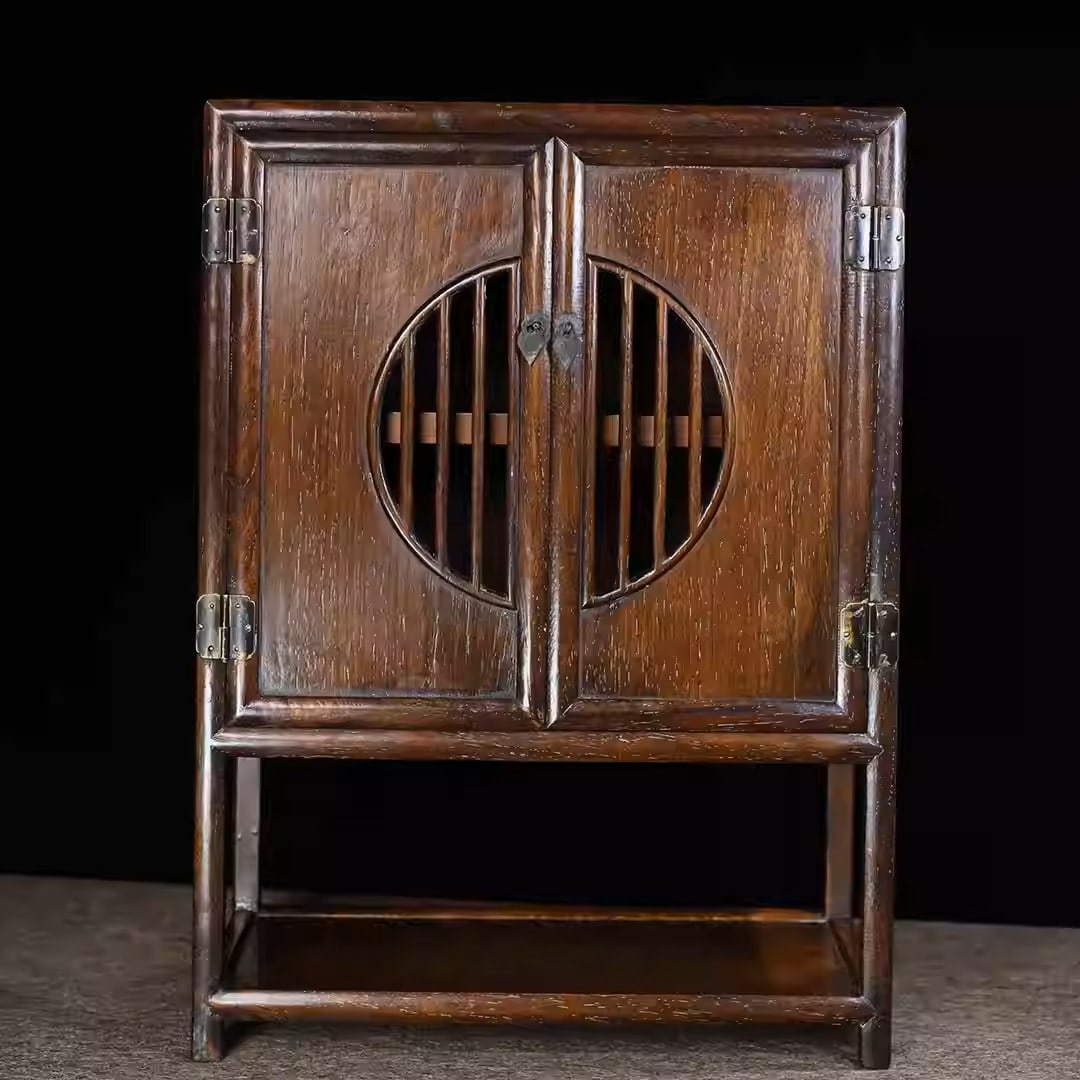 Rosewood cabinet with openwork carving and double hinged doors (1 of 5)