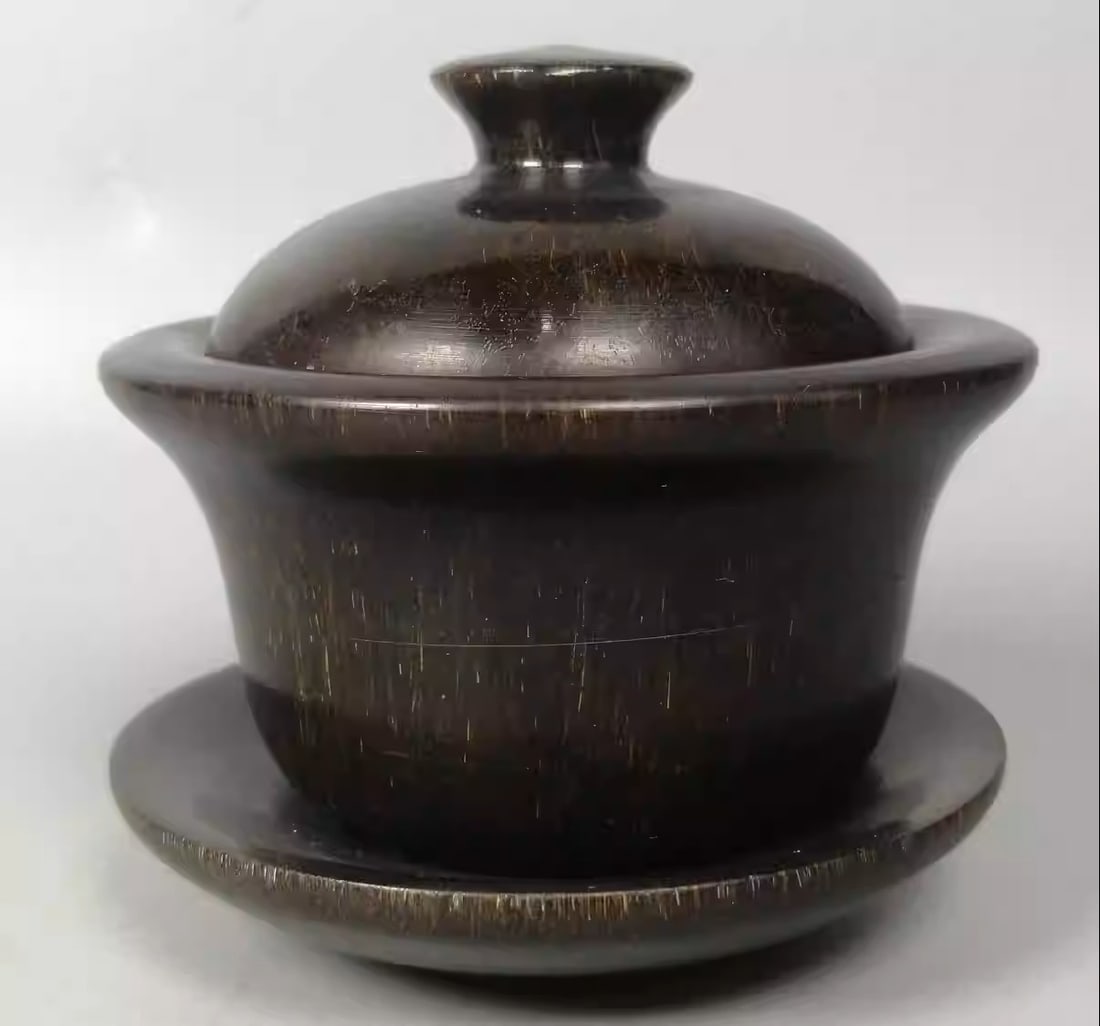 Intricately carved ox horn cup (1 of 5)