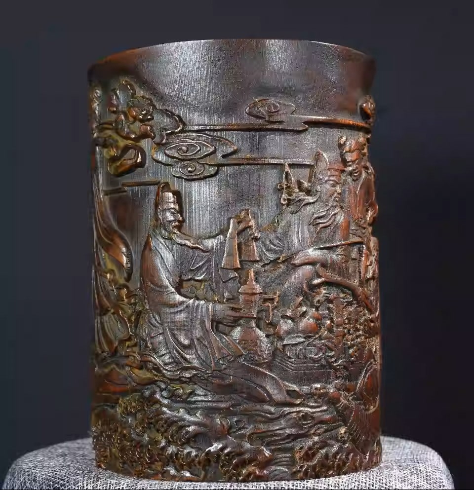 Bamboo carved pen holder depicting the Eight Immortals crossing the sea (1 of 5)