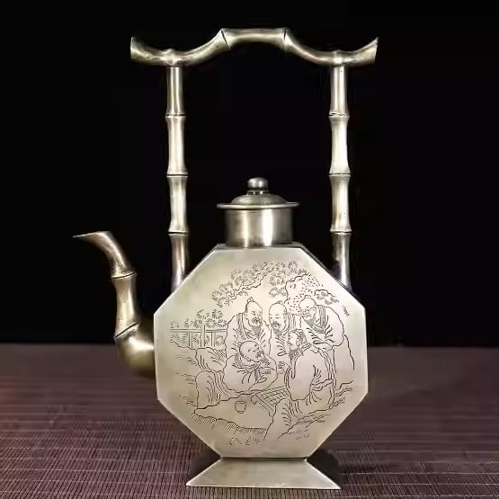 White copper engraved octagonal wine pot with bamboo-shaped handle, depicting landscapes and figures (1 of 5)