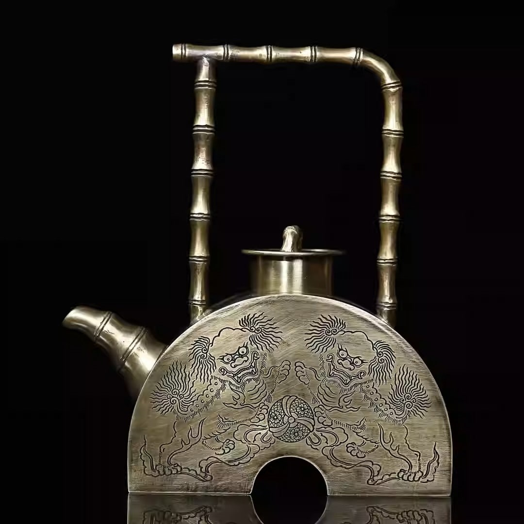 White copper wine pot with bamboo-shaped handle, engraved with a design of lions playing with (1 of 5)
