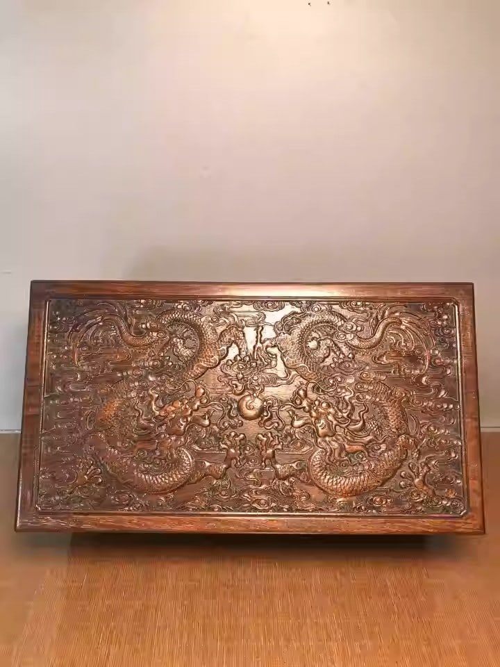 Rosewood treasure chest with carved relief of a dragon playing with a pearl (1 of 5)