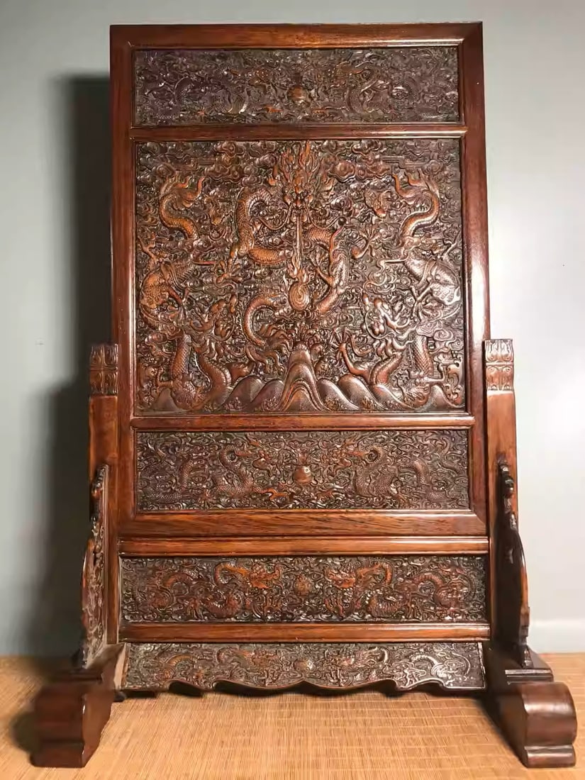 Rosewood intricately carved screen ornament depicting a dragon playing with a pearl (1 of 5)