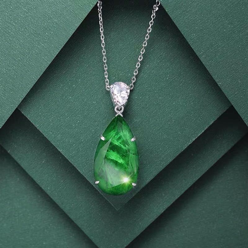 925 Silver Emerald Pendant: 925 Silver Emerald Pendant ****** Metal: 925 Silver / Main Stone: Emerald / Color: Green / Pendant Size: 18*43mm / Length : 45cm
