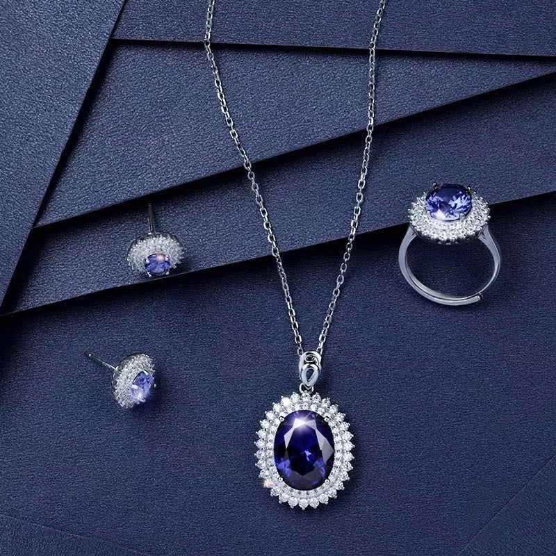 925 Silver Tanzanite Pendant Earrings and Ring Three-Piece Set: 925 Silver Tanzanite Pendant Earrings and Ring Three-Piece Set ****** Metal: 925 Silver / Main Stone: Tanzanite / Color: Blue / Pendant Size: 20*25mm / Length : 52cm / Earring Size: 10*12mm / Ring