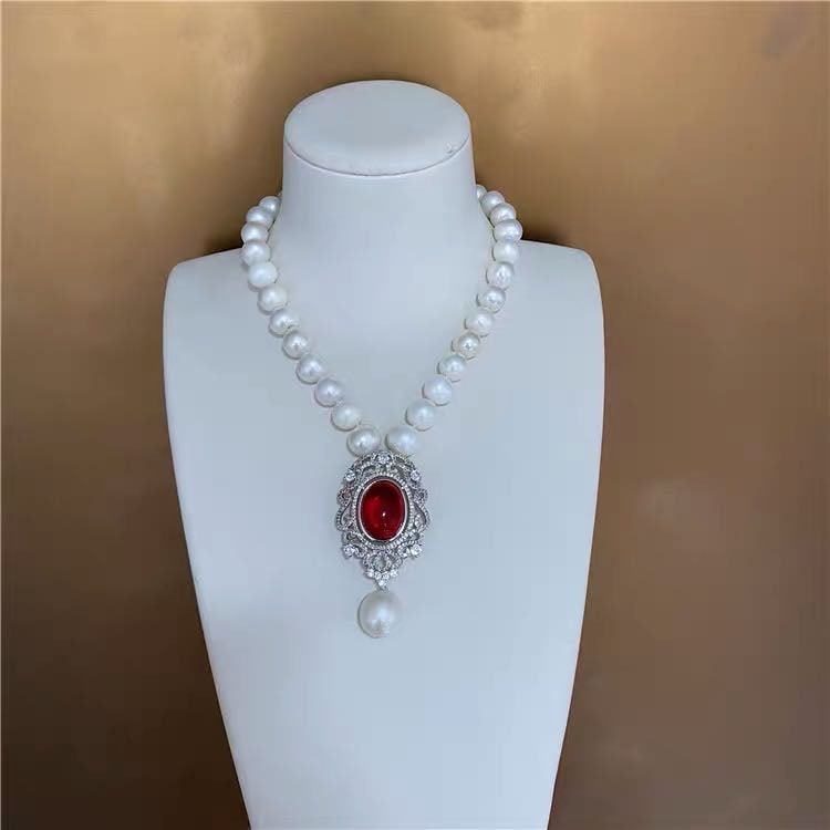 Natural Pearl Necklace Embeded Ruby 925 Silver Pendant: Natural Pearl Necklace Embeded Ruby 925 Silver Pendant ****** Metal: Natural Pearl / Color: White / Pearl Diameter 12mm, Necklace Length 40mm