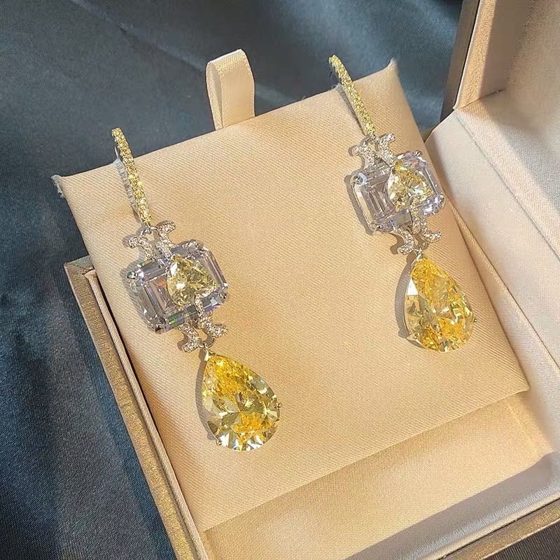 925 Silver Yellow Gem Earrings: 925 Silver Yellow Gem Earrings ****** Metal: 925 Silver / Main Stone: Yellow Gem / Color: Yellow / Earring Size: 12*60mm
