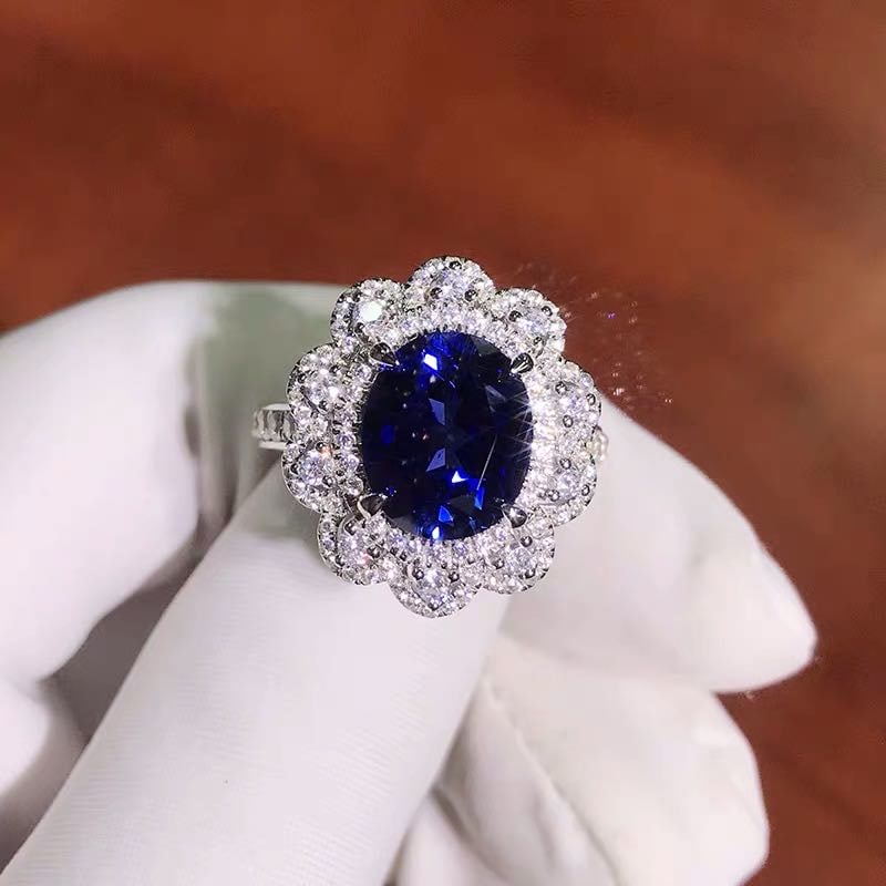 925 Silver 4ct Tanzanite Ring: 925 Silver 4ct Tanzanite Ring ****** Metal: 925 Silver / Main Stone: Tanzanite / Color: Blue / Carat Weight: 4 / Main Stone Size: 9*11mm / Size: 17*19.5mm