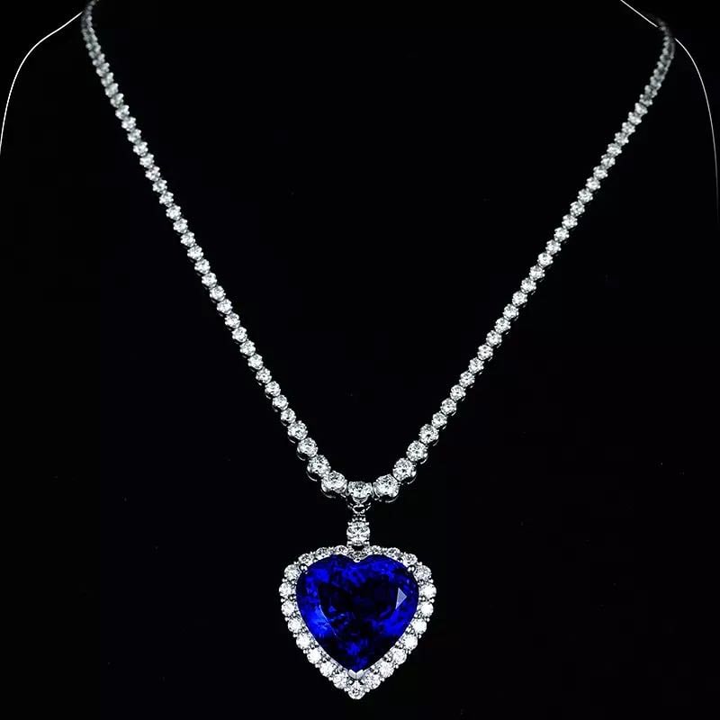 925 Silver 48ct Tanzanite Ocean Heart Necklace: 925 Silver 48ct Tanzanite Ocean Heart Necklace ****** Metal: 925 Silver / Main Stone: Tanzanite / Color: Blue / Carat Weight: 48 / Main Stone Size: 20*20mm / Pendant Size: 26*26mm / Length: 45cm