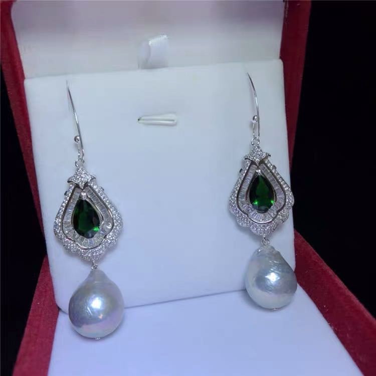 Natural Baroque Irregular Pearl Embeded Emerald 925 Silver Earrings: Natural Baroque Irregular Pearl Embeded Emerald 925 Silver Earrings ****** Metal: Natural Baroque Irregular Pearl / Color: White / Pearl Diameter 12mm