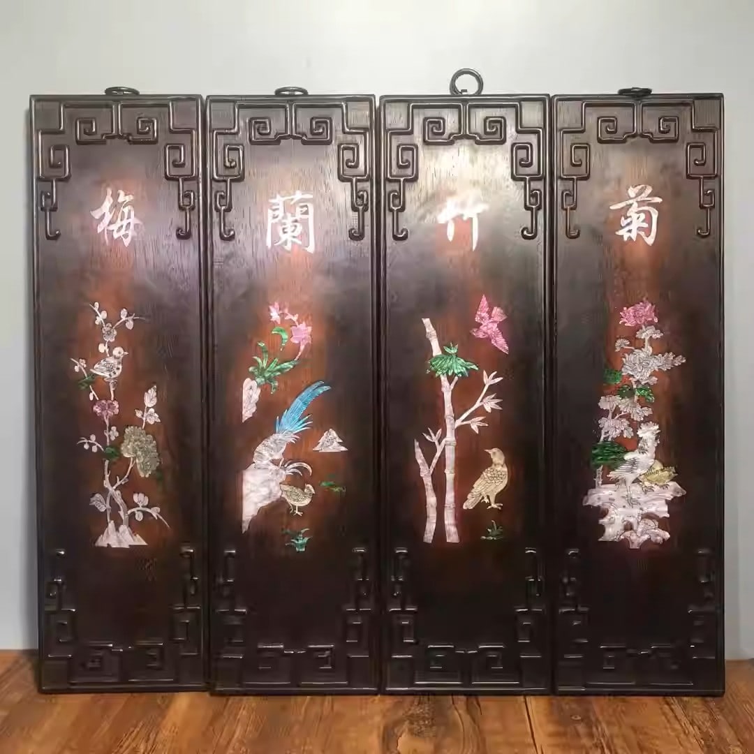 Four sandalwood hanging screens inlaid with colorful seashells depicting plum blossoms, orchids, (1 of 5)