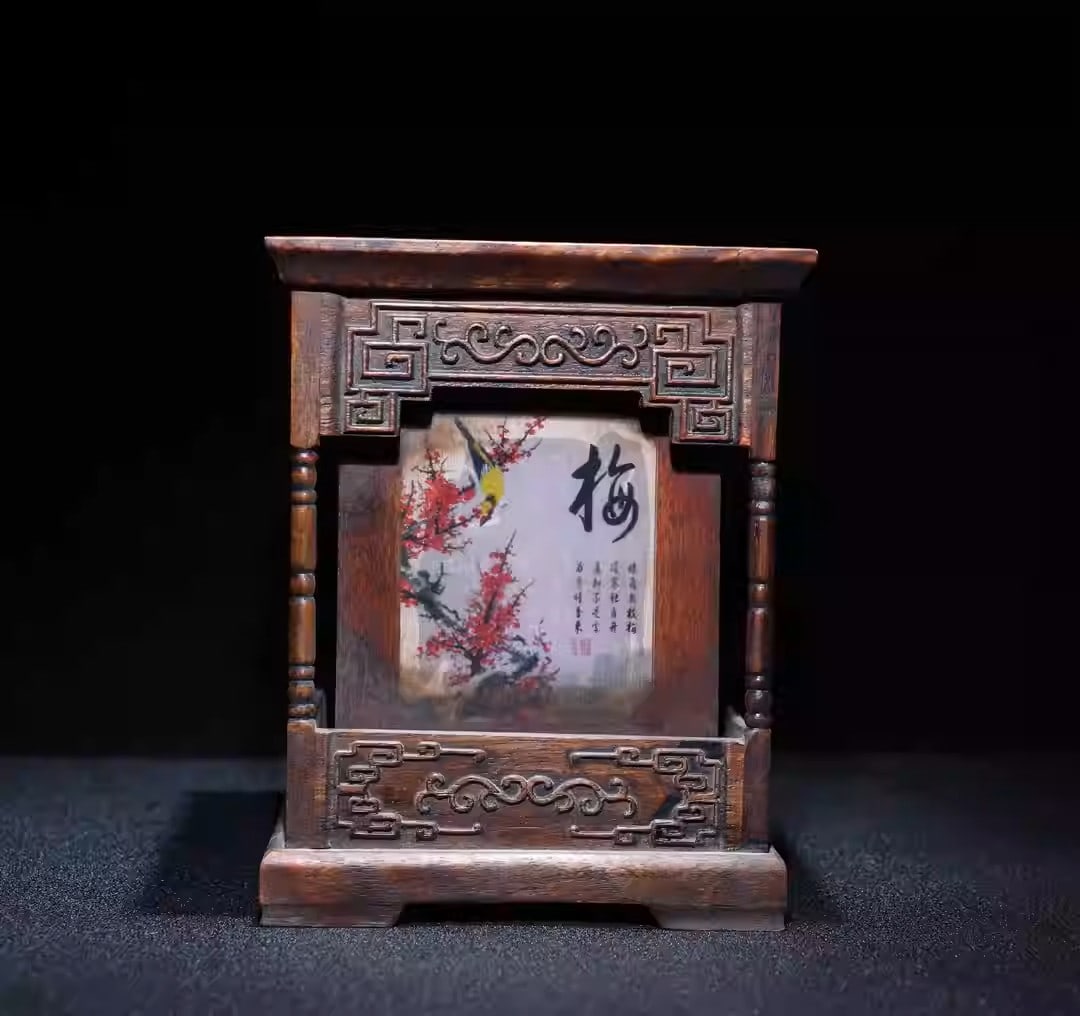 Rosewood pen holder with intricate openwork carvings of plum blossoms, orchids, bamboo, and: Height: 14.5 cm, Width: 11.5 cm, Weight: 383 grams