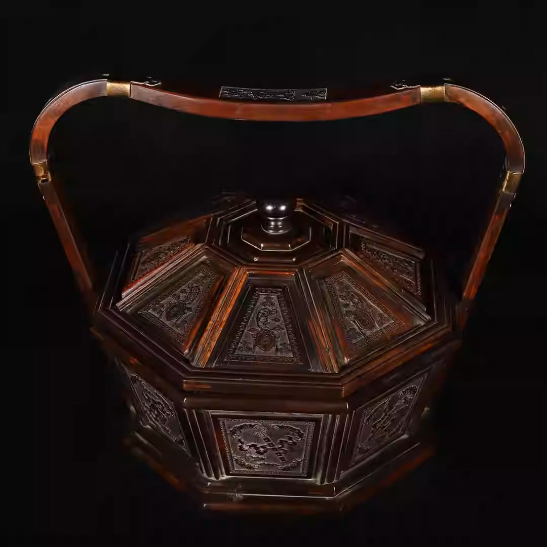 Rosewood carved octagonal food box with eight treasures motif: Length 36 cm, width 28 cm, height 30 cm, weight 1620 grams.
