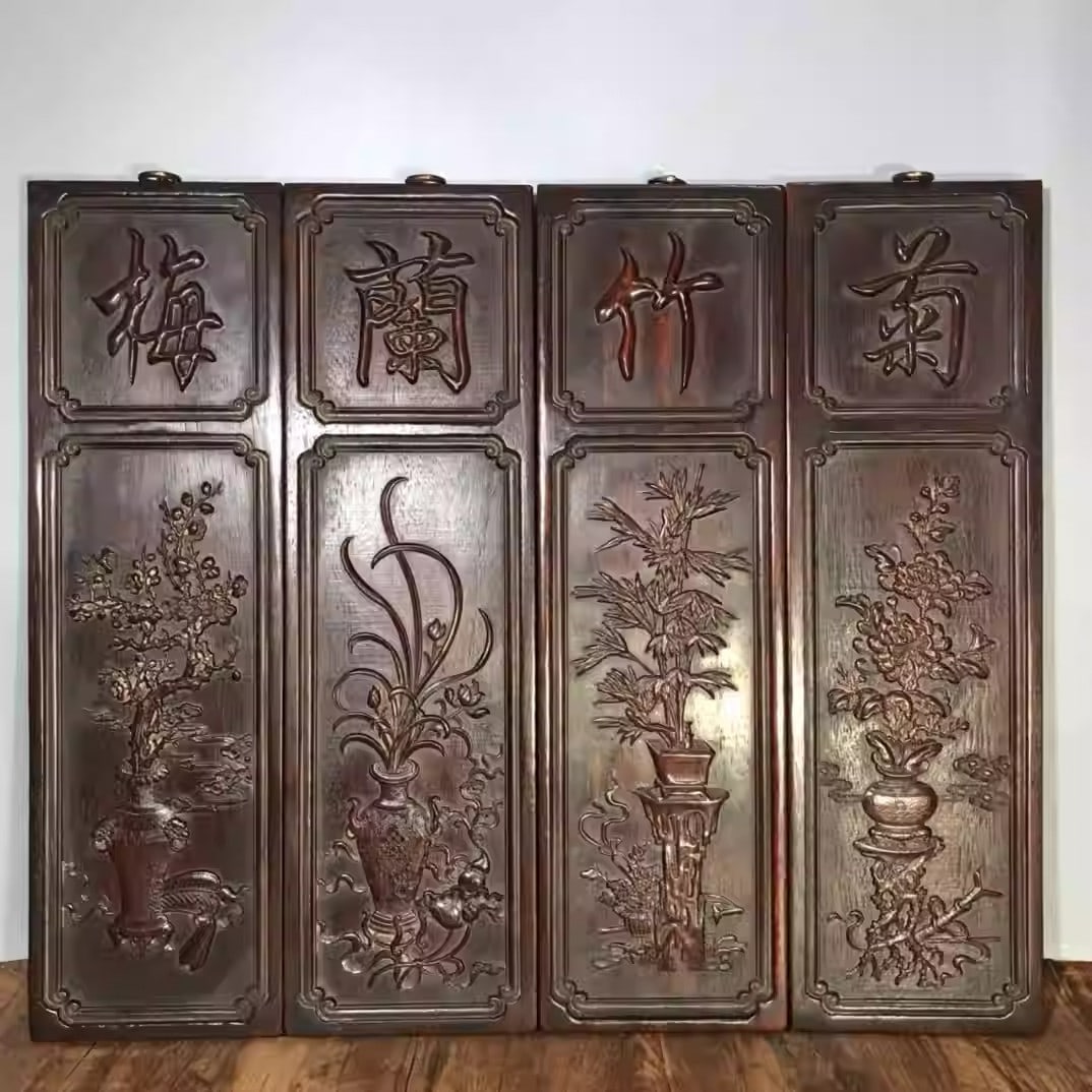 Four carved sandalwood hanging screens depicting plum blossoms, orchids, bamboo, and chrysanthemums: Each piece is 50 centimeters high, 15 centimeters wide, and 3 centimeters thick.