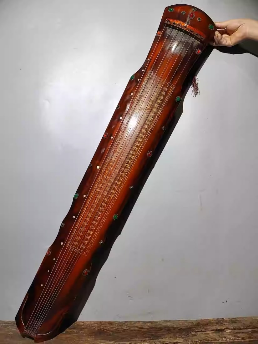 Paulownia wood lacquerware seven-stringed zither with a "Hundred Longevity Symbols" design: Dimensions: Length 123cm, Width 20cm, Height 6cm Weight: 2050g