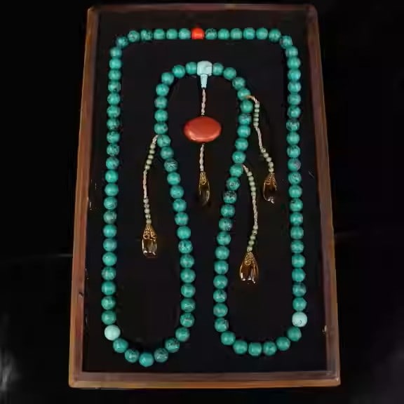 A string of turquoise prayer beads used in the Qing dynasty imperial court (1 of 5)