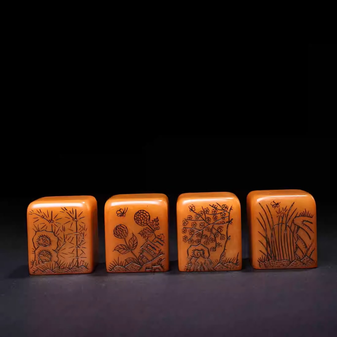 A set of Shoushan stone carved plum blossom, orchid, bamboo and chrysanthemum seals: Dimensions: Width 3.5cm, Height 4cm, Each Weight: 120g