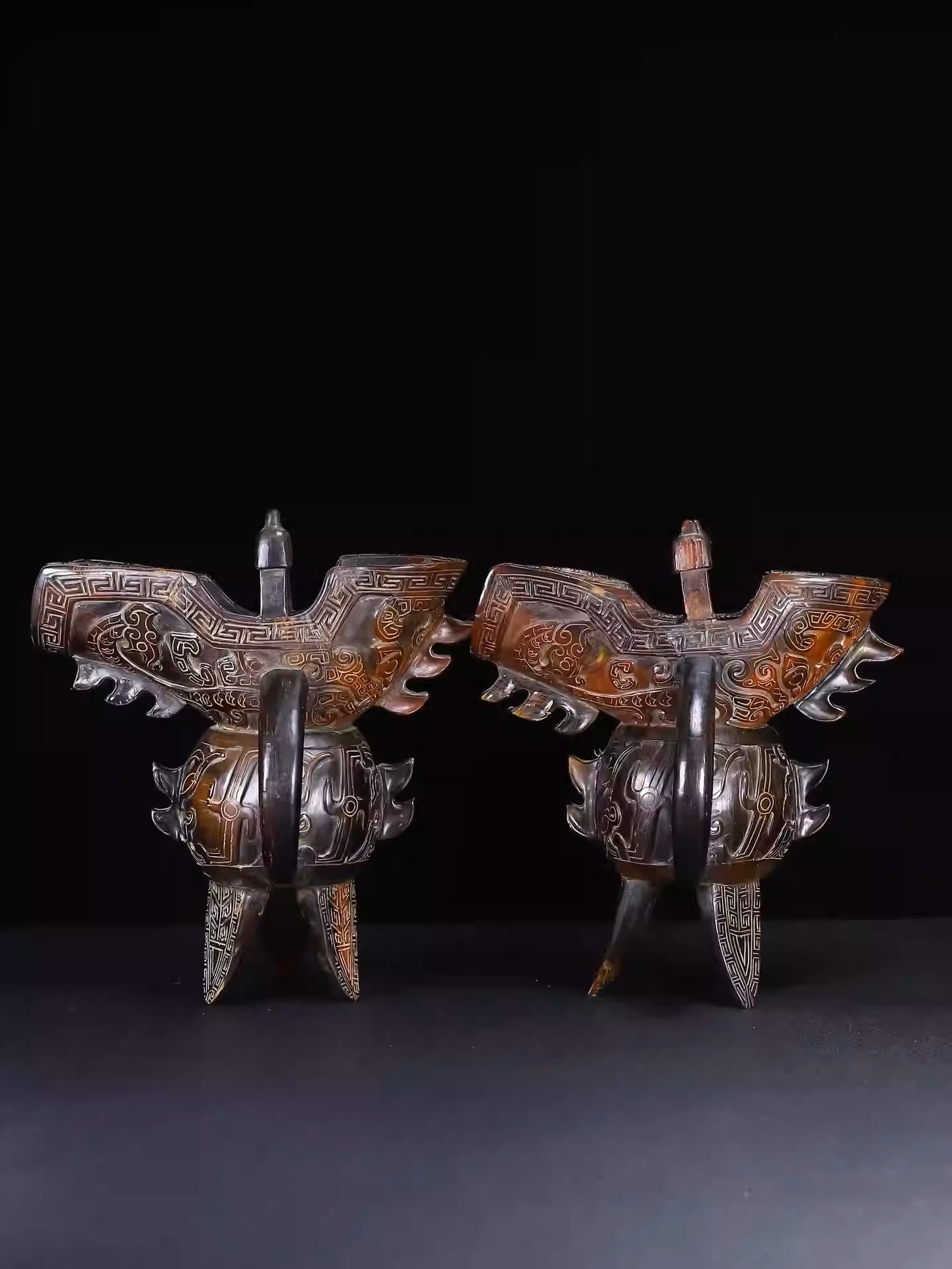 A Pair of Carved Horn Tripod Cups with Tiger Motifs: Dimensions: Height 23cm, Width 20cm, Weight: 1698g