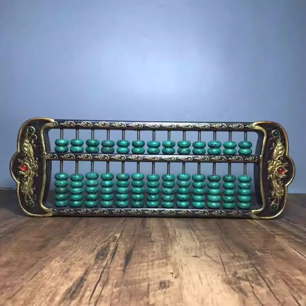 Wooden lacquerware abacus with gold inlay and gemstone embellishments: Dimensions: Length 41cm, Width 14cm, Height 2.5cm