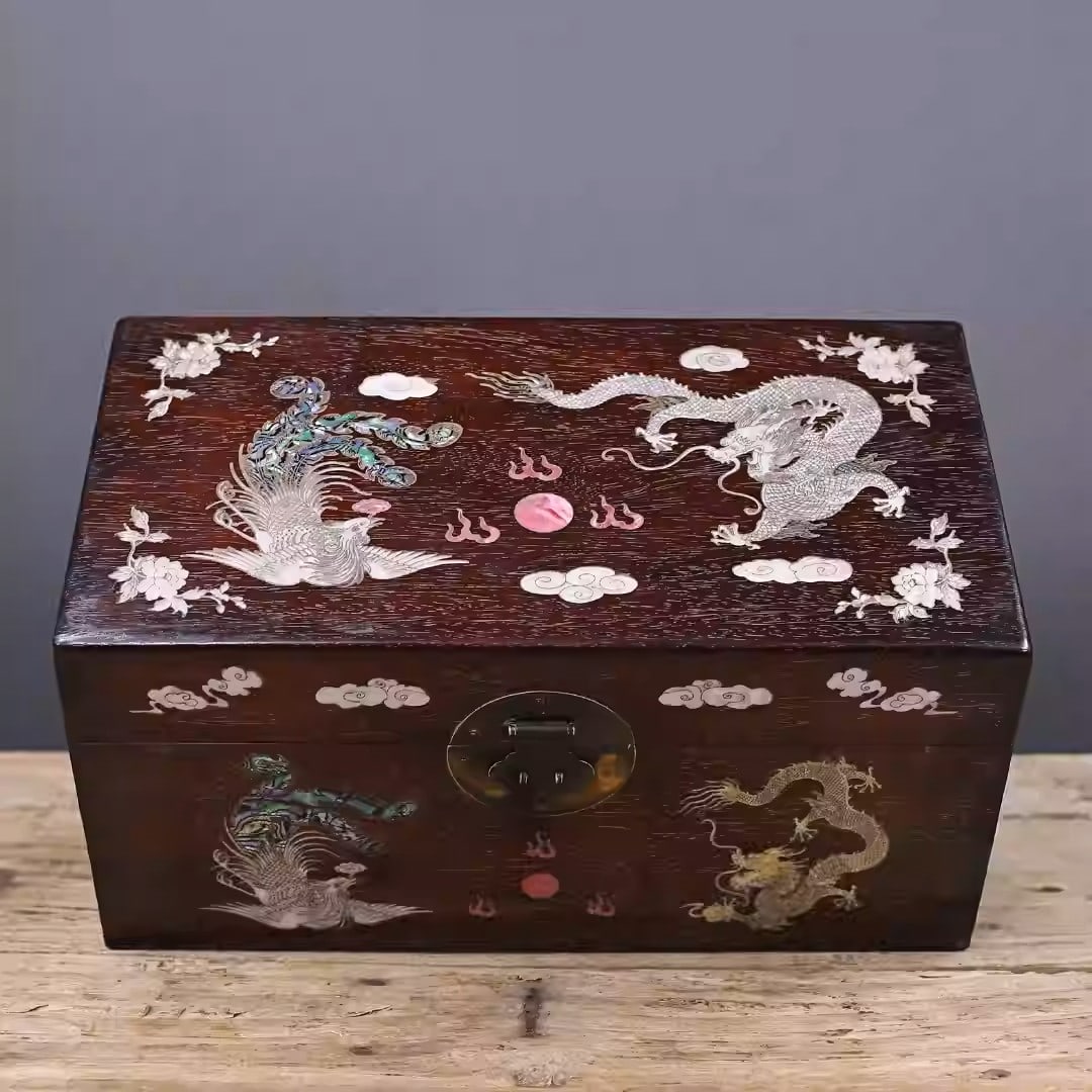 Sandalwood storage box inlaid with colorful seashells depicting a dragon and phoenix motif: Dimensions: Length 40cm, Width 22cm, Height 20cm Weight: 3000g