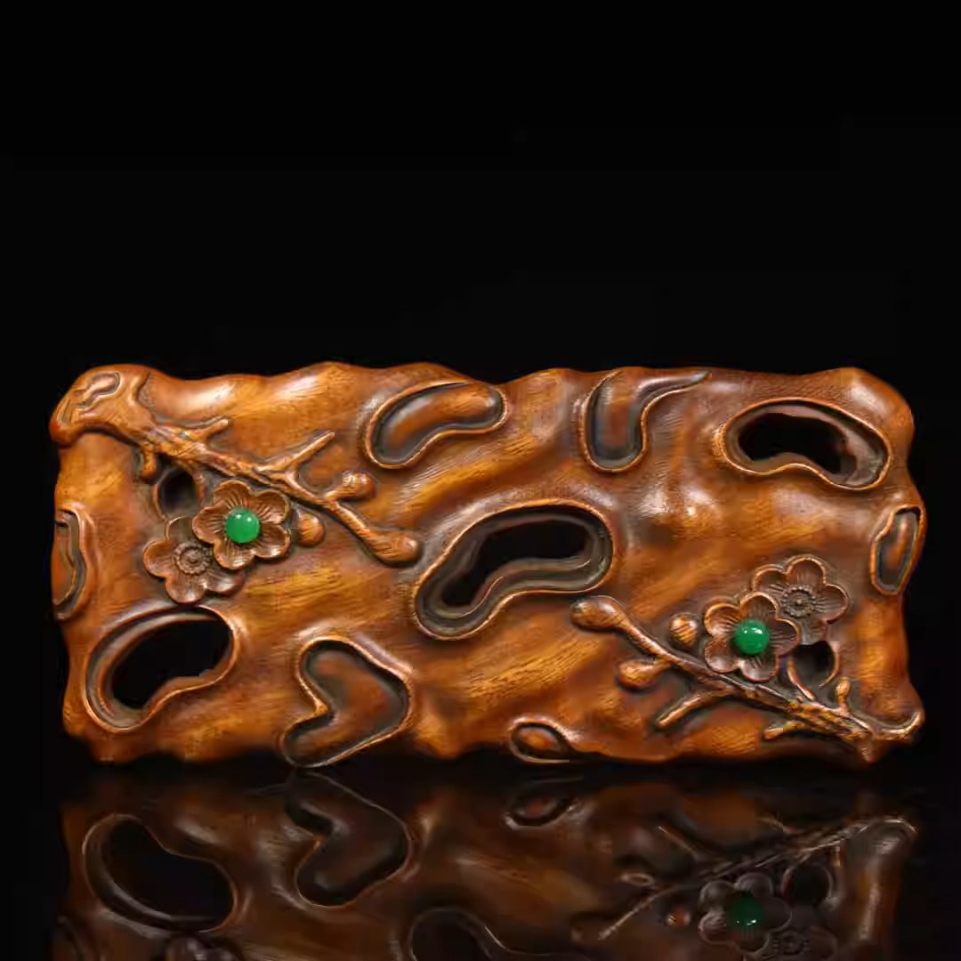 Rosewood inkstone stand with intricately carved plum blossom design: Dimensions: Length 21cm, Width 9cm, Height 2cm Weight: 206g