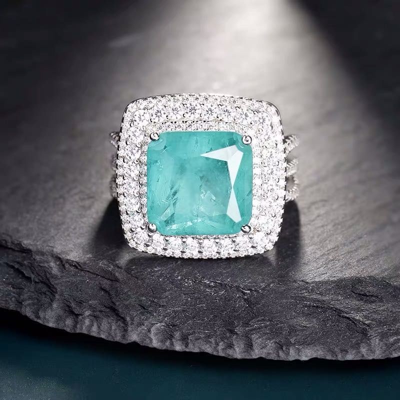 925 Silver Paraiba Ring: 925 Silver Paraiba Ring ****** Metal: 925 Silver / Main Stone: Paraiba / Color: Blue / Diameter: 17mm