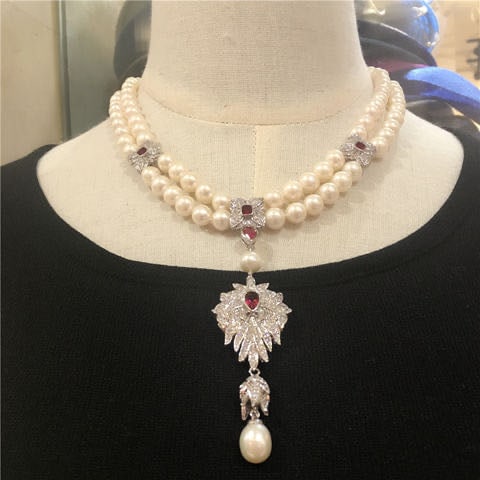 Natural Pearl Necklace Embeded Ruby 925 Silver Pendant: Natural Pearl Necklace Embeded Ruby 925 Silver Pendant ****** Metal: Natural Pearl / Color: White / Pearl Diameter 10mm, Necklace Length 45mm