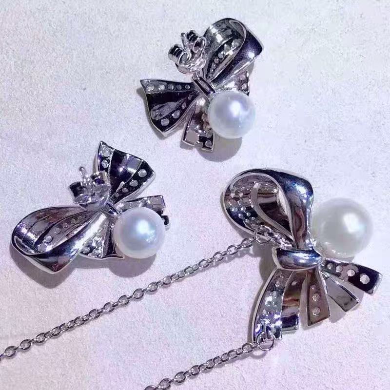 Natural Pearl 925 Silver Pendant and Earrings Two-Piece Set: Natural Pearl 925 Silver Pendant and Earrings Two-Piece Set ****** Metal: Natural Pearl / Color: White / Pearl Diameter 11mm