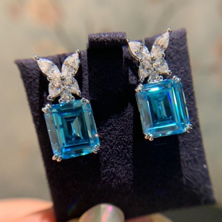 925 Silver Topaz Earrings: 925 Silver Topaz Earrings ****** Metal: 925 Silver / Main Stone: Topaz / Color: Blue / Main Stone Size: 10*13mm / Earrings Size: 10*25mm