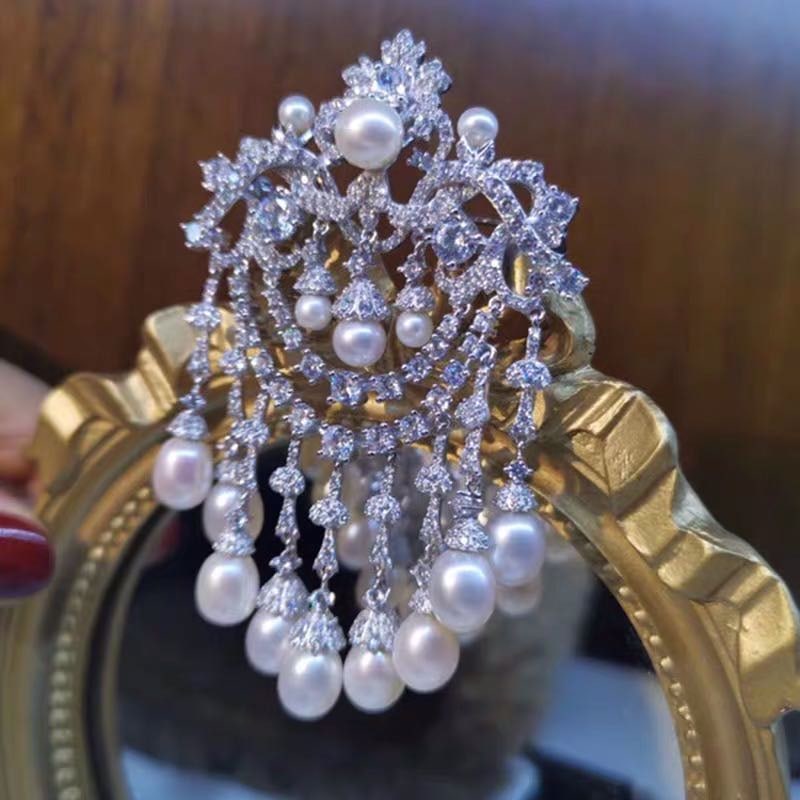 Natural Pearl 925 Silver Brooch: Natural Pearl 925 Silver Brooch ****** Metal: 925 Silver / Total Item Weight: 22 grams / Brooch Length: 70mm