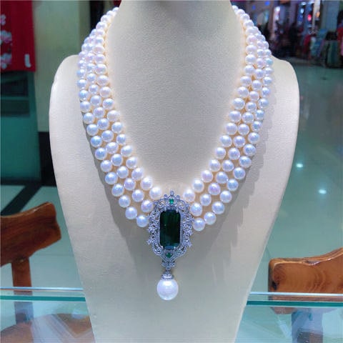 Natural Pearl Necklace Embeded Emerald 925 Silver Pendant: Natural Pearl Necklace Embeded Emerald 925 Silver Pendant ****** Metal: Natural Pearl / Color: White / Pearl Diameter 9mm, Necklace Length 45mm