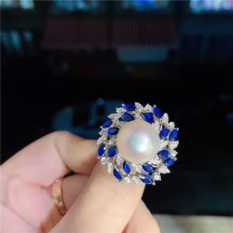Natural Pearl Embeded Sapphire 925 Silver Ring: Natural Pearl Embeded Sapphire 925 Silver Ring ****** Metal: Natural Pearl / Color: White / Pearl Diameter 12.5mm