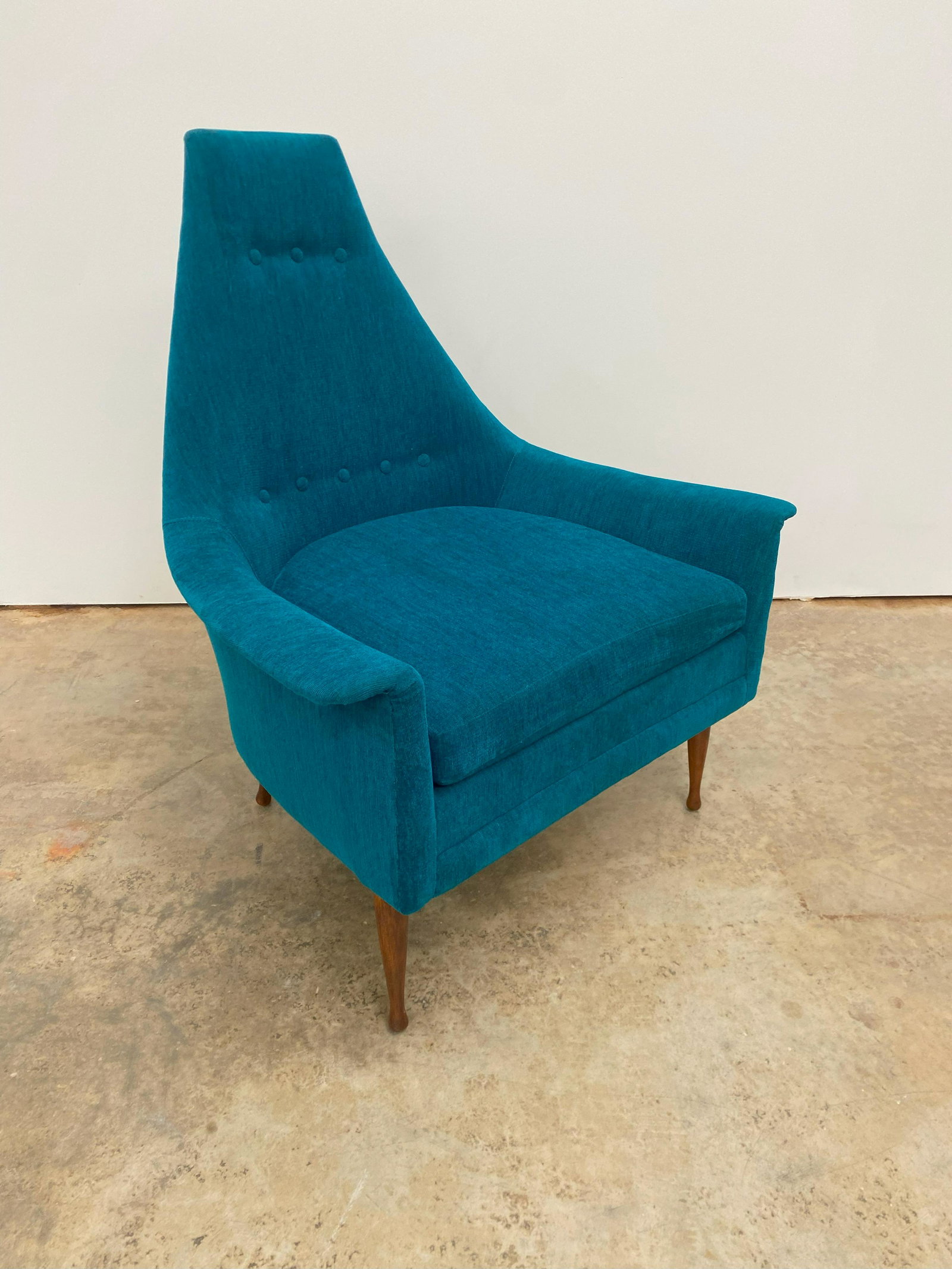 Mid Century Lounge Chair: Beautiful teal mid century lounge chair. Unique shape. Has been reupholstered. Seat height: 18 inches.