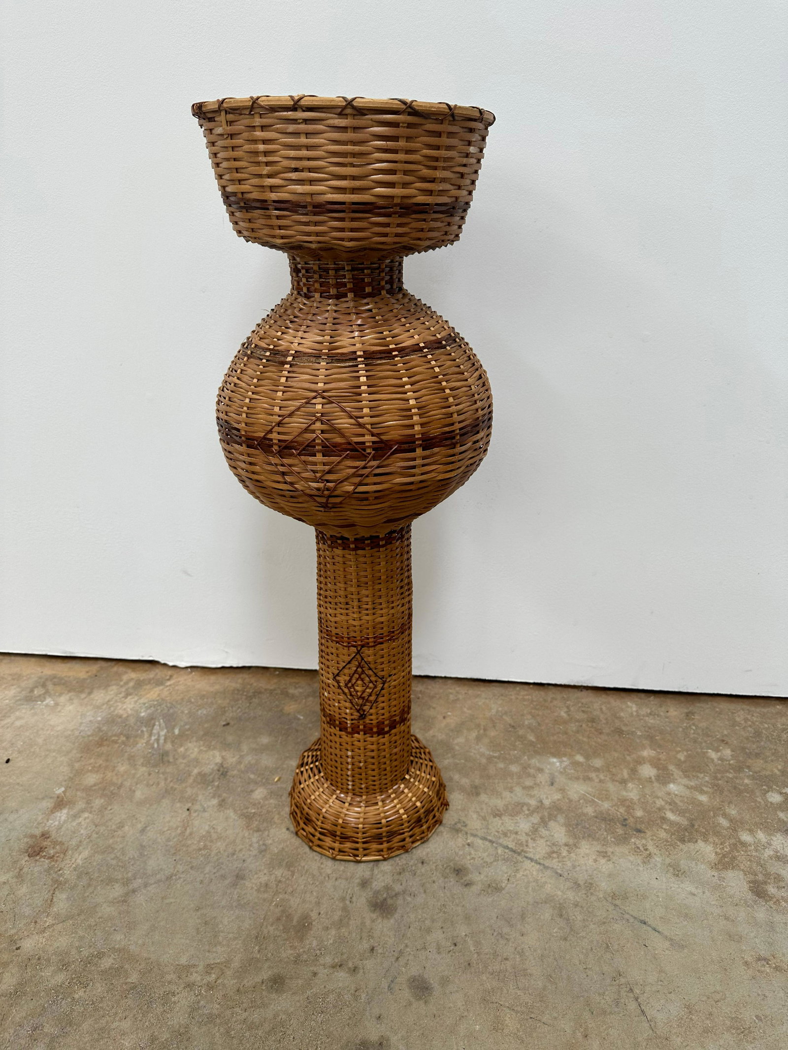 Wicker Planter: Vintage wicker planter.