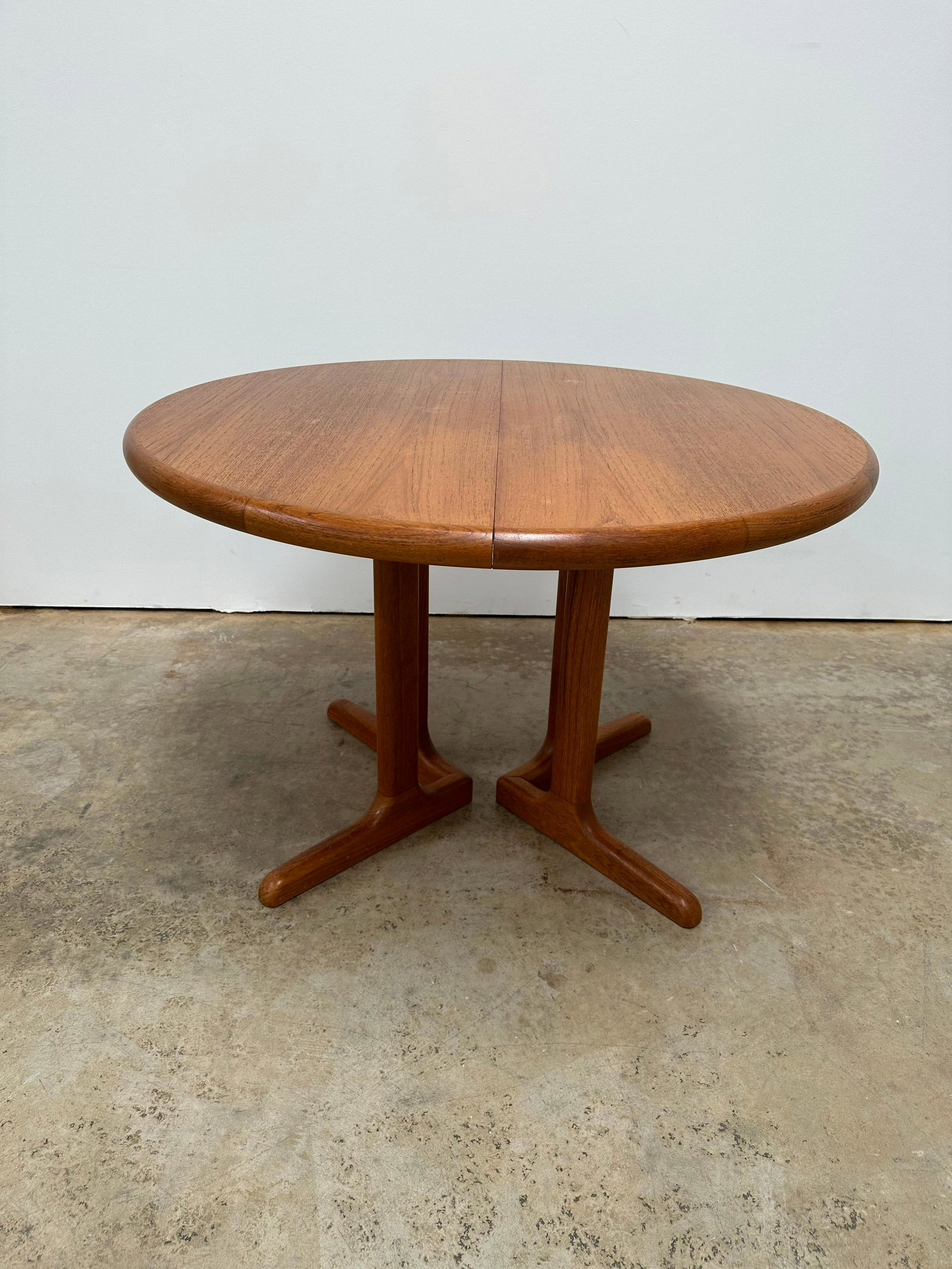Teak Dining Table: Teak dining table. Comes with 1 leaf. 1960s. Leaf adds 12 inches.