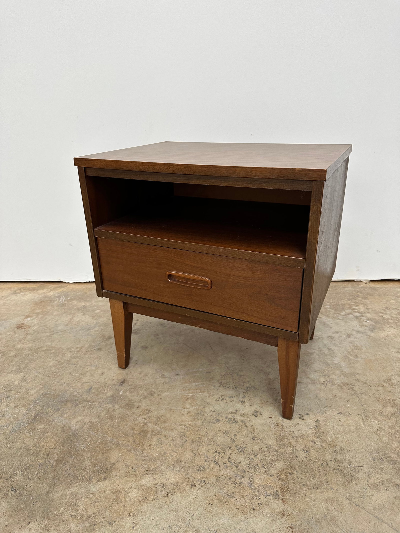 Mid Century Nightstand: Mid century nightstand one drawer. Formica top.