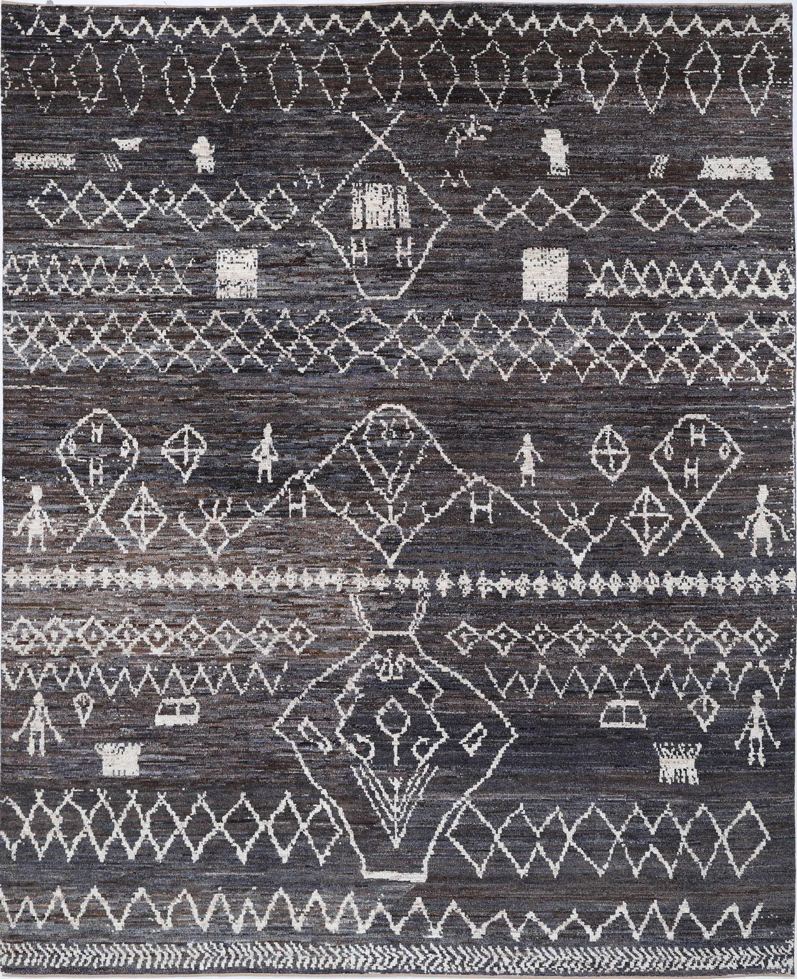 Hand Knotted Morocan Wool Rug - 11'9" x 9'4": Hand-knotted by skilled artisans in Afghanistan, this wool rug from the Morocan collection measures a generous 11'9" by 9'4" in a refined rectangular shape, showcasing a commanding tribal design that 